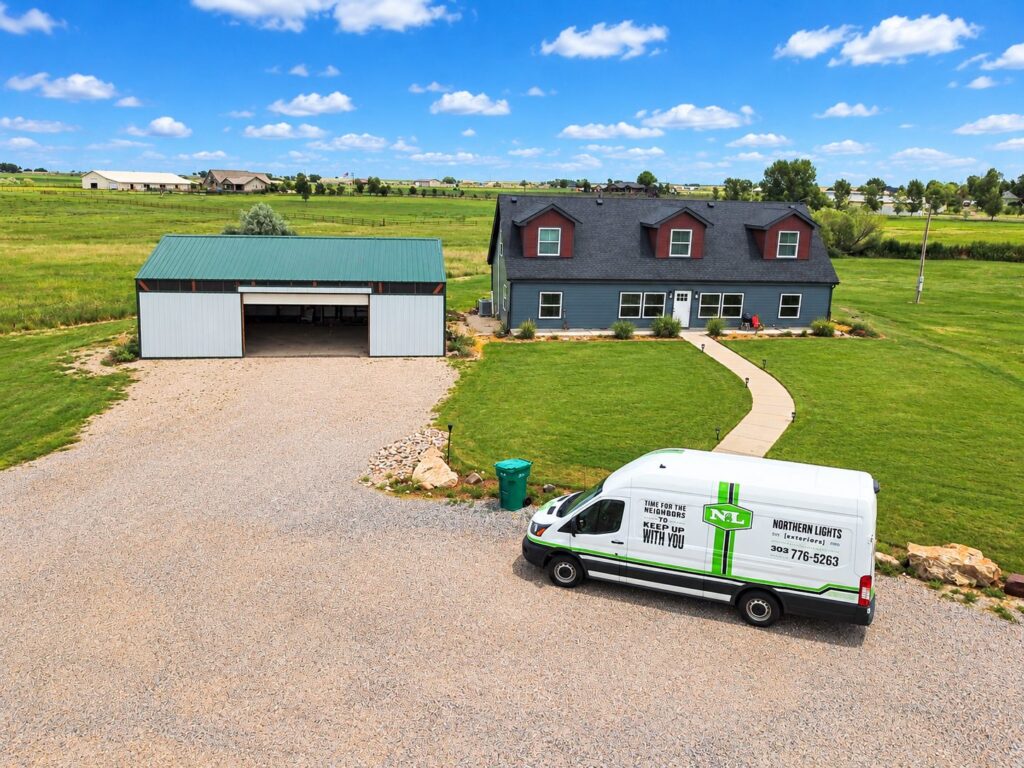 Fort Lupton, Colorado acreage home after a multi-trade exterior remodel by Northern Lights Exteriors - new roof, siding, and windows