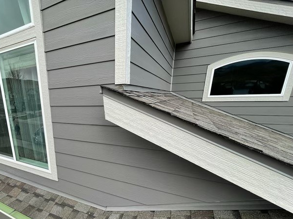 Close-up of new James Hardie lap siding and window trim on a Golden, CO home by Northern Lights Exteriors