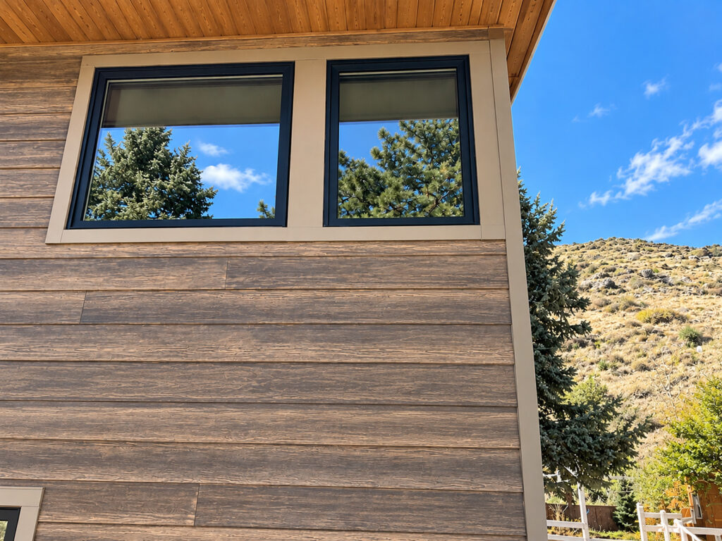 WoodTone James Hardie fiber cement siding on a Golden, CO home by Northern Lights Exteriors